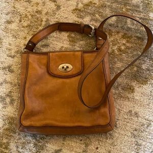 Fossil brown leather messenger bag.